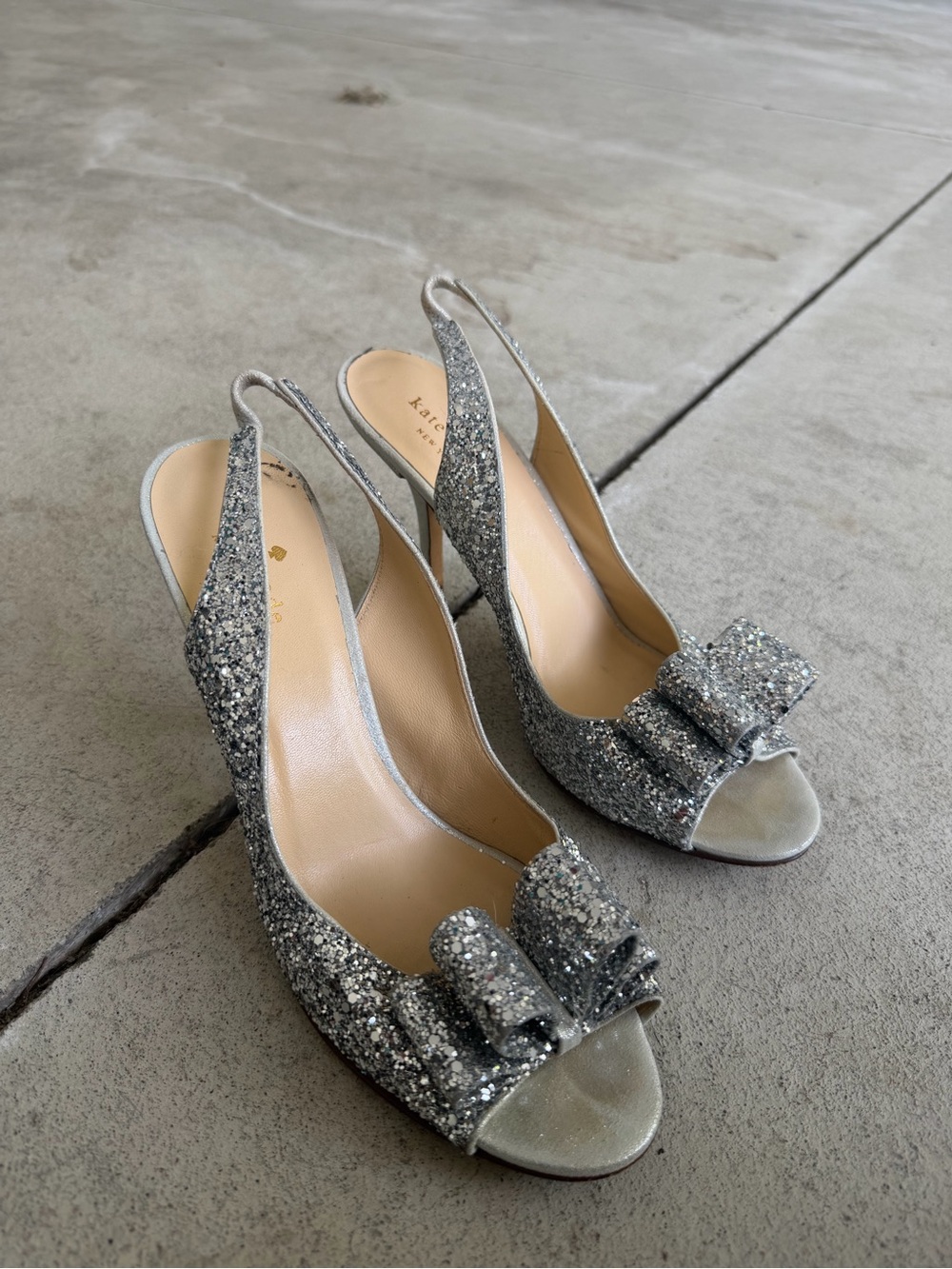 kate spade Silver Glitter Peep-Toe Slingback Heels with Bow Accent